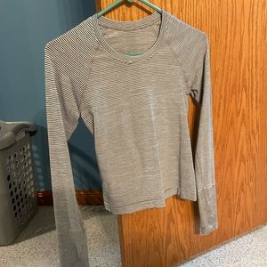 Like new lululemon swiflty tech long sleeve we are from space white size 4